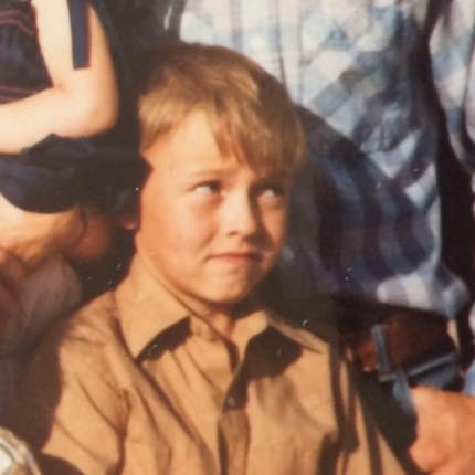 Polaroid of eight-year-old Tony on the ranch in 1983.